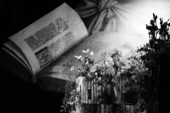 books as flowerpots in b&w